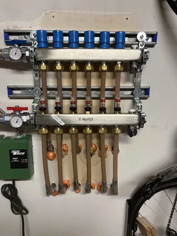 Plumber performing Water Heater Repair at a residential property in Bangor